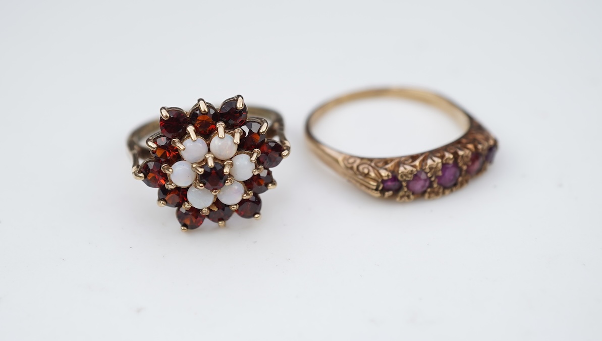 Two 19th century white metal mounted horn snuff mulls, one engraved 'John Calder', the other with inset tiger's eye quartz cabochon, both a.f., largest 83mm.